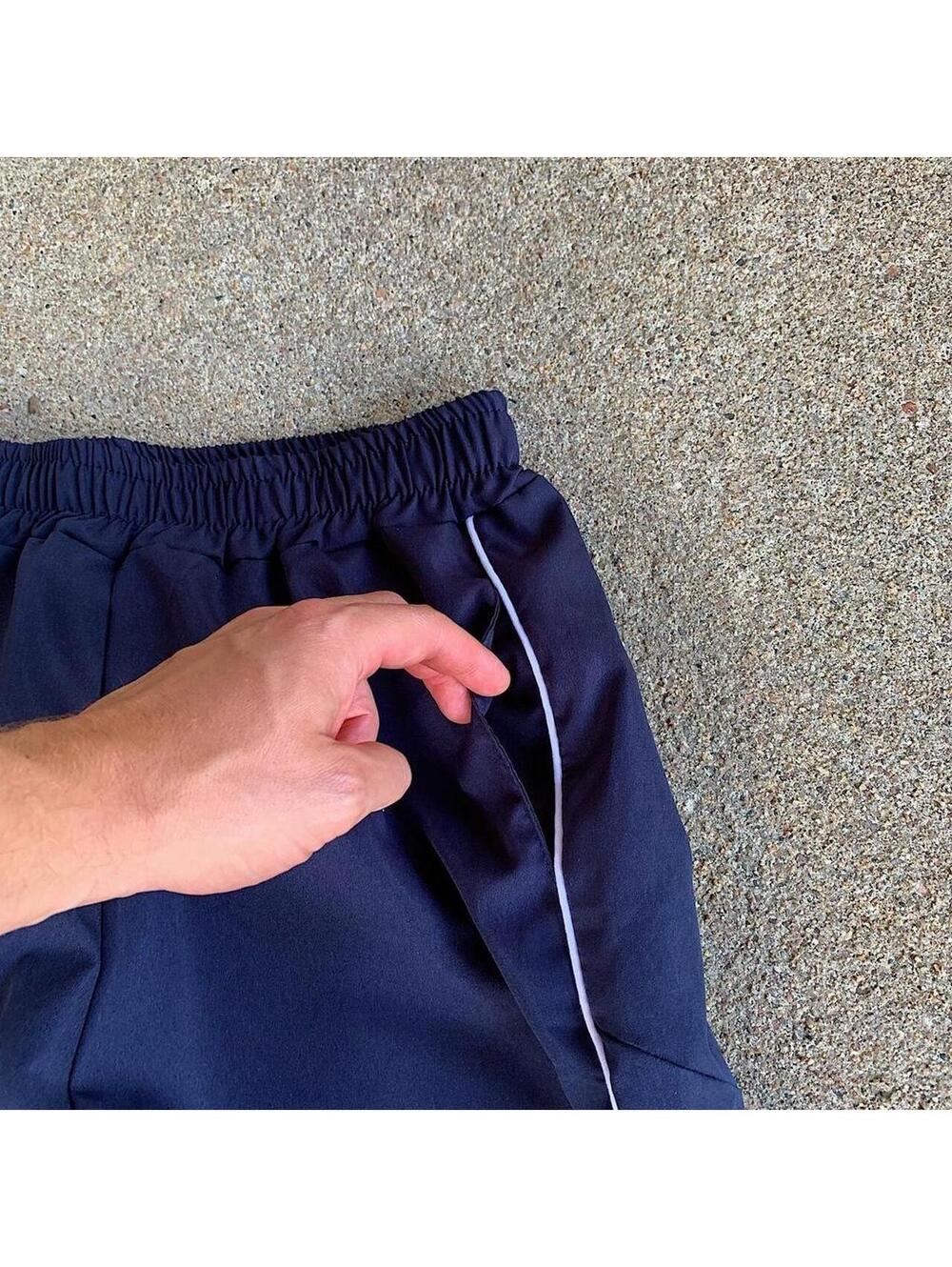 lightweight striped blue and white windbreaker pants. Wide leg opening. Size - Picture 8 of 8
